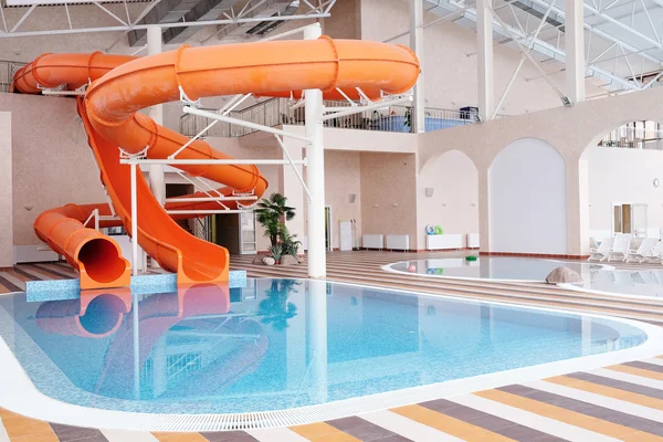 Swimming pool and aqua park in a resort hotel — Stock Photo, Image