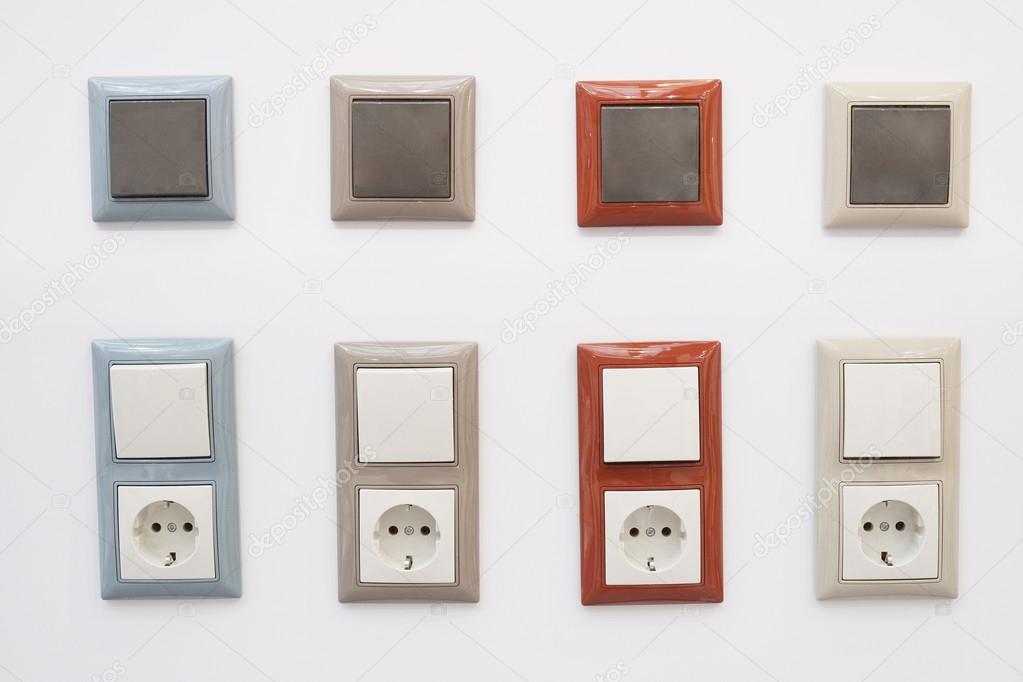 Wall outlet with switches