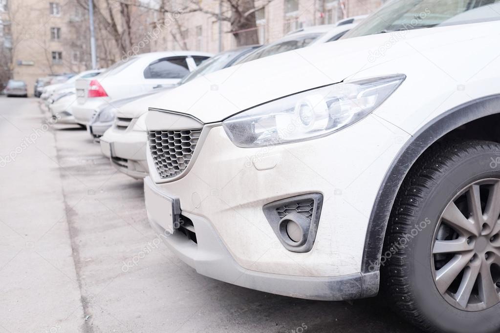 Vehicles parked in parking lot