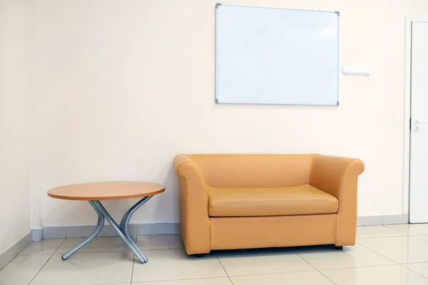 Leather sofa and table — Stock Photo, Image