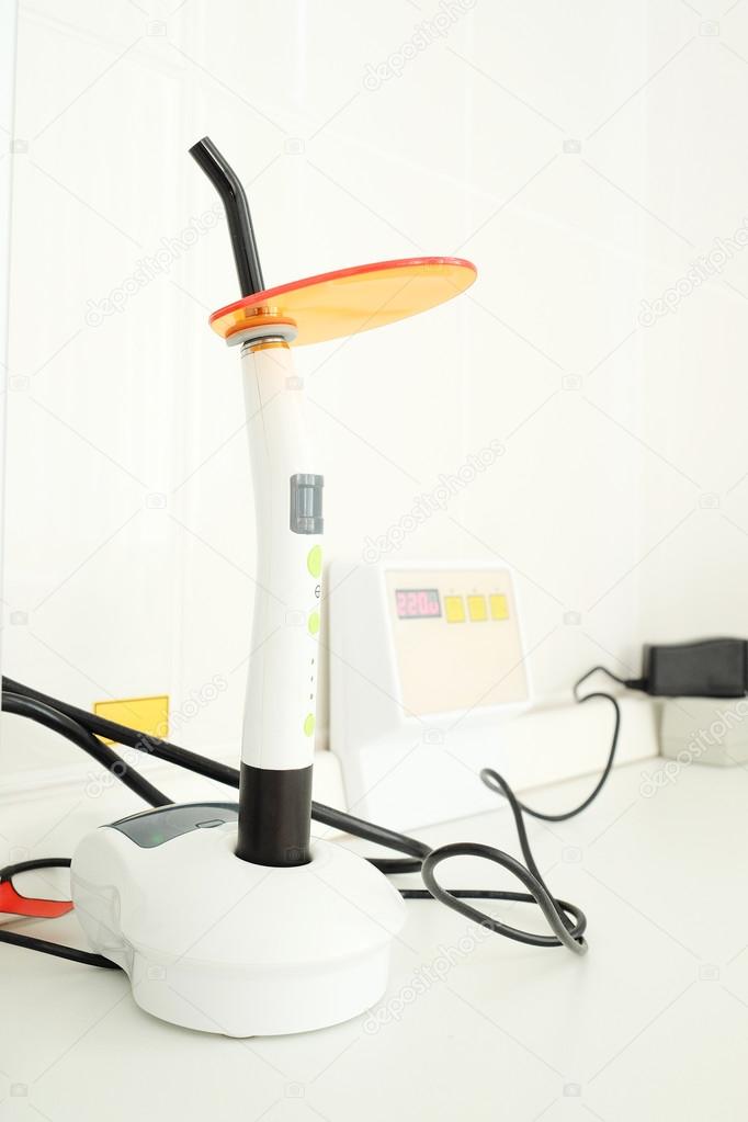 Dental ultraviolet curing light tool Stock Photo by ©uatp12 67764819