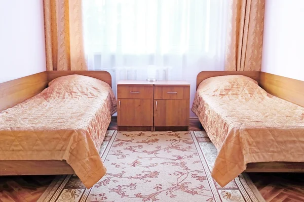 Bedroom interior in a motel — Stock Photo, Image