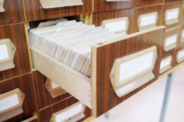 Drawers with catalog cards in library clipart