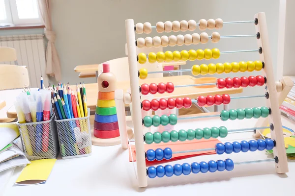 Wooden abacus with colorful beads — Stock Photo, Image