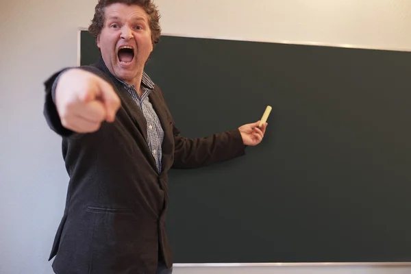 Male teacher in anger yelling — Stock Photo, Image