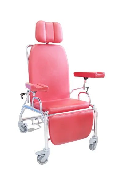 Красное кресло для инъекций — стоковое фото