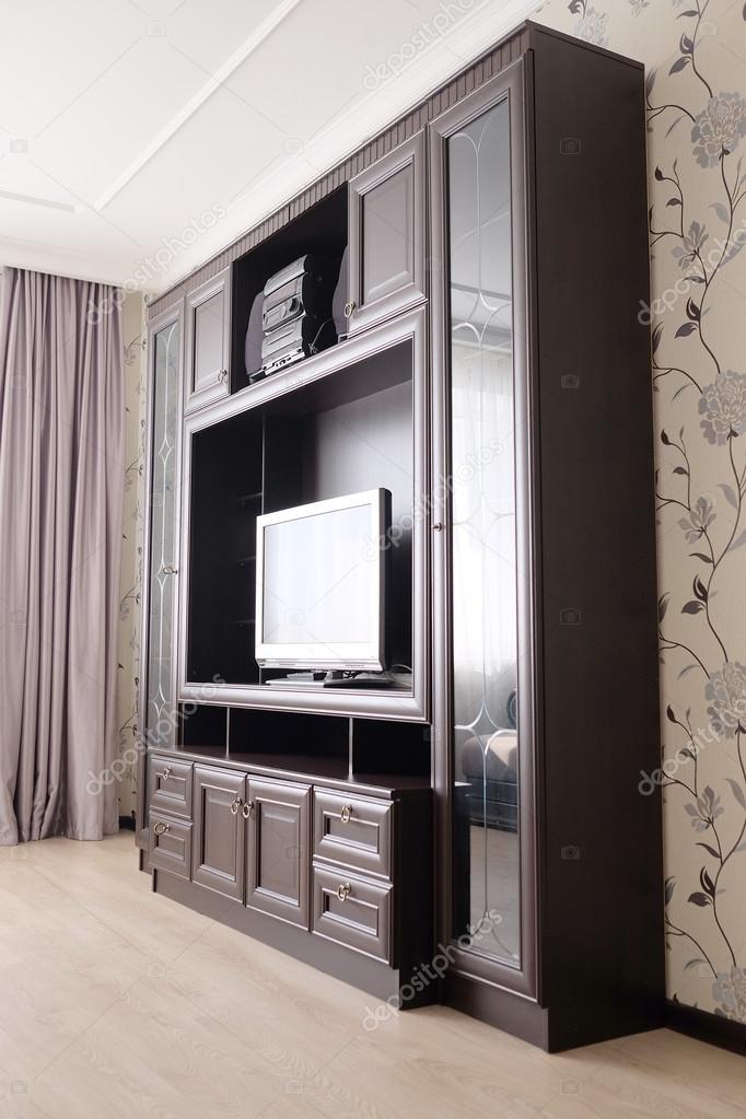 Bedroom with TV and wardrobes