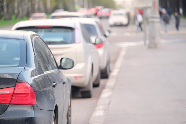 Vehicles parked in parking lot — Stock Photo, Image