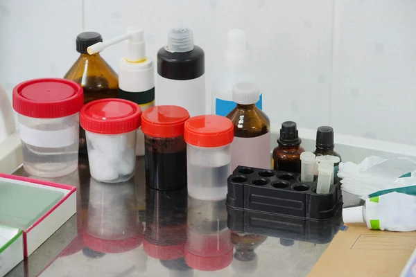 Medicines bottles in room — Stock Photo, Image