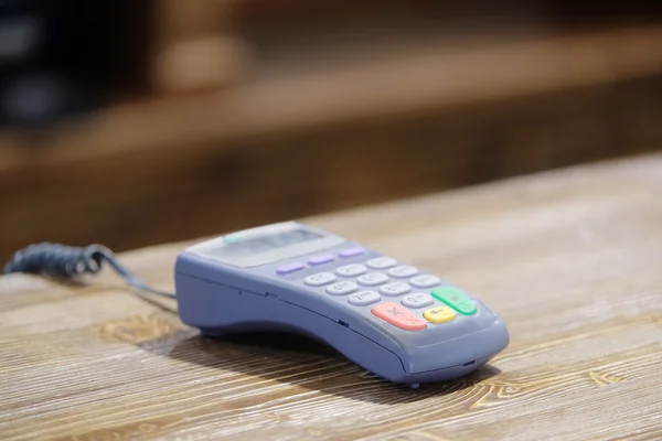 Plastic card reader on a counter — Stock Photo, Image