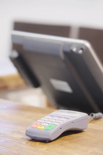 Plastic card reader on a counter — Stock Photo, Image