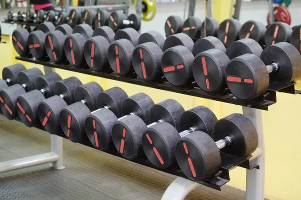Dumbbells in sport gym — Stock Photo, Image