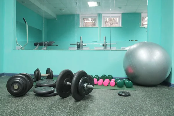 Dumbbells in sport gym — Stock Photo, Image