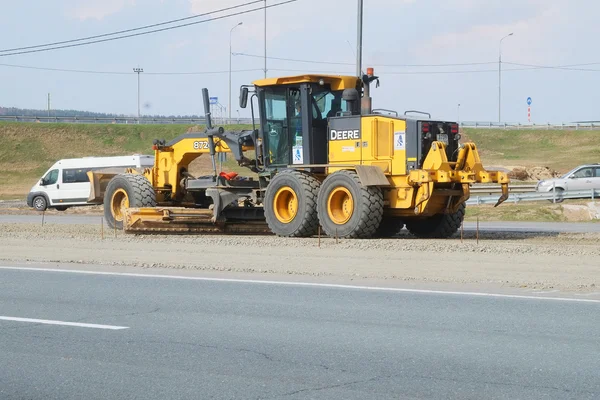 Travaux d'équipement à la réparation de la route — Photo