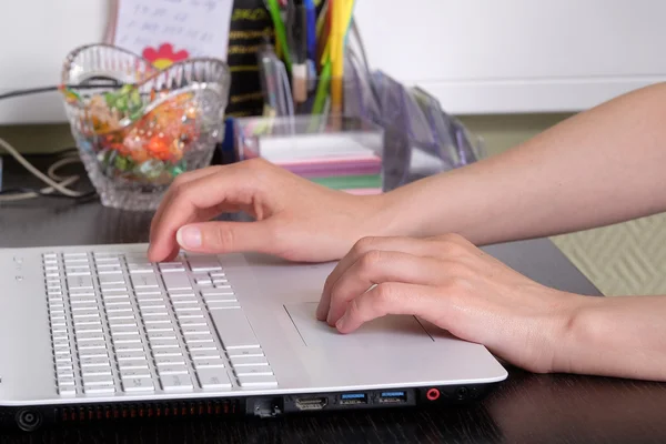 Female hands with laptop — Stock Photo, Image