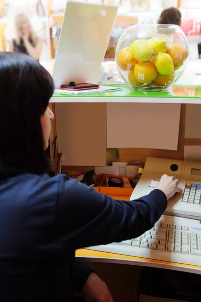 Portrait of  girl cashier — Stock Photo, Image