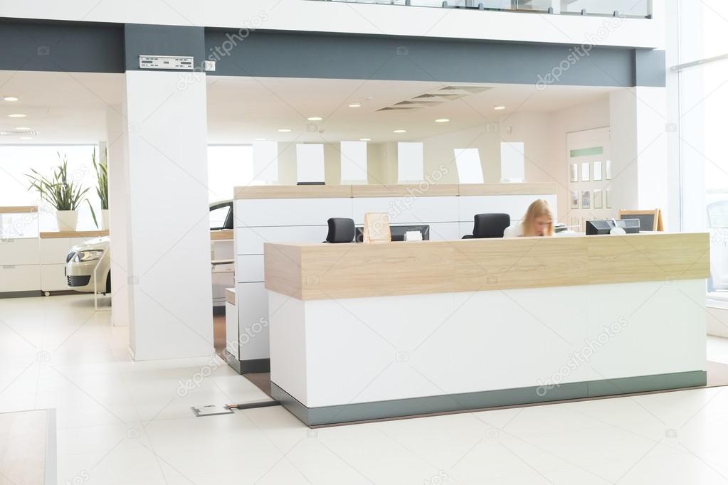 Working place of managers in a dealer's car showroom