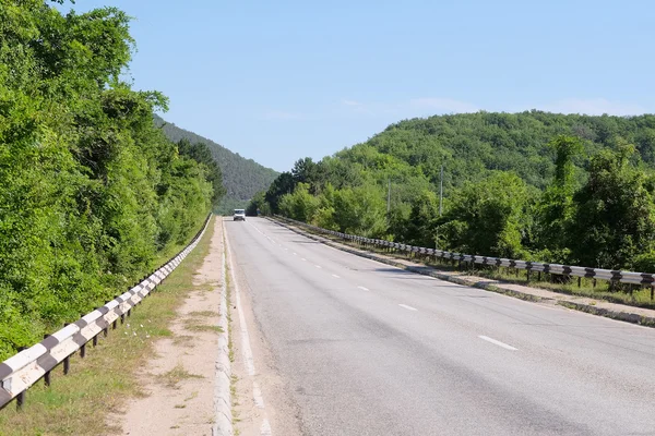 Paisaje con la imagen de un camino de montaña —  Fotos de Stock