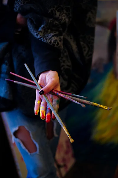 Painter's hand with a brush — Stock Photo, Image