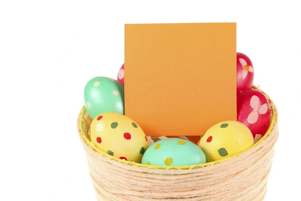 Basket of colorful Easter eggs — Stock Photo, Image