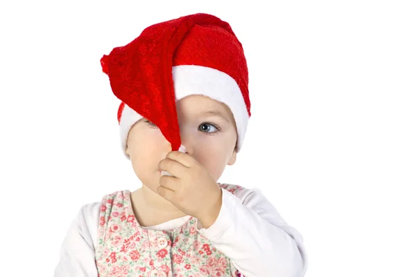 Bebê menina vestindo santa chapéu — Fotografia de Stock