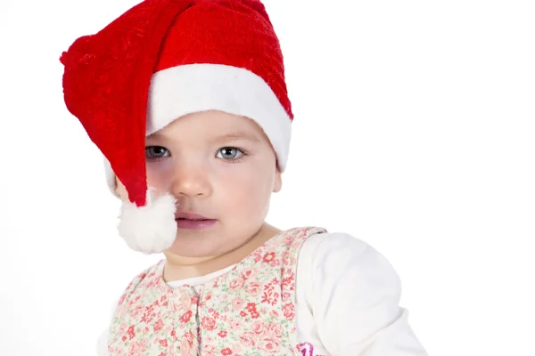 Bebê menina vestindo santa chapéu — Fotografia de Stock