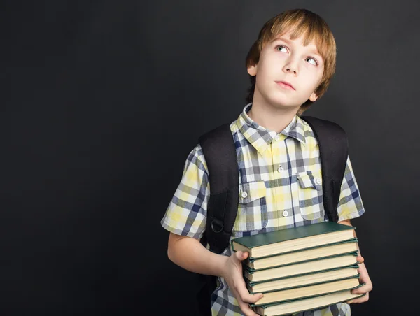 Portret student met hoop boeken in handen — Stockfoto