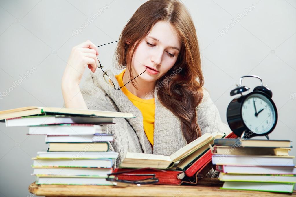 Girl student with glasses reading books Stock Photo by ©anelina 69990491 Girl student with glasses reading books Stock Photo by ©anelina 69990491