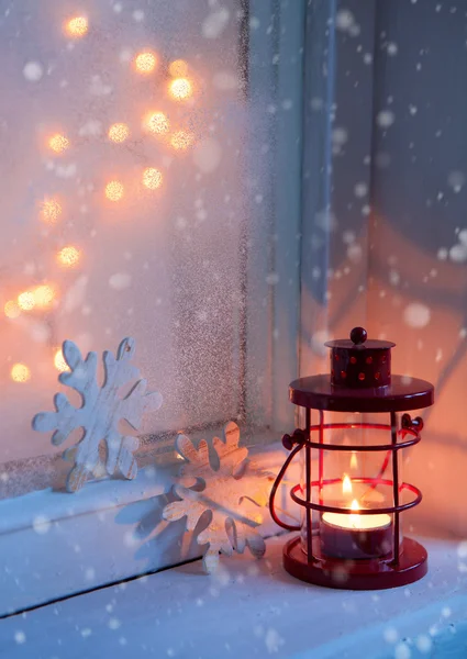 Red lantern in night on old window. — Stock Photo, Image