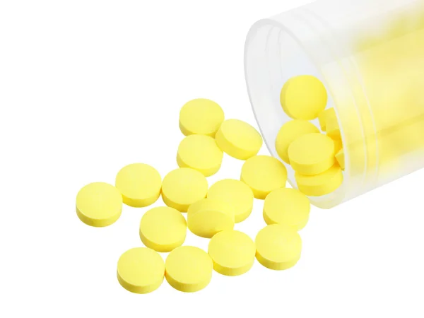 Tarro con pastillas amarillas — Foto de Stock