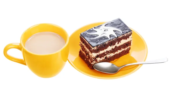 Kaffee und Schokoladenkuchen auf orangefarbenem Teller — Stockfoto