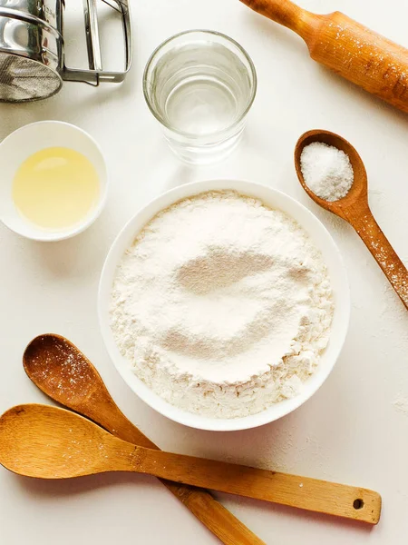 Dough kneading set of ingredients, preparation for baking. Shallow dof.