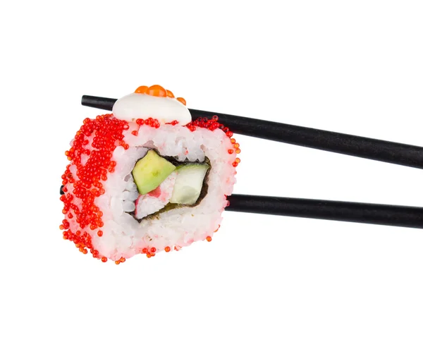 Sushi roll in chopsticks Isolated on white — Stock Photo, Image