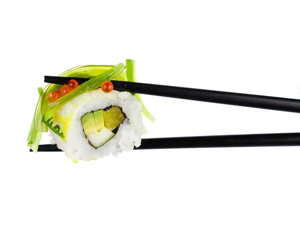 Sushi roll in chopsticks Isolated on white — Stock Photo, Image
