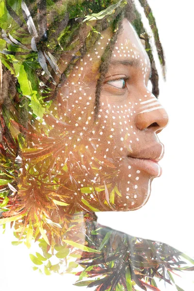 Young man double exposure portrait with leaves — Stock Photo, Image