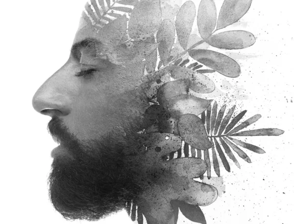 Un hombre barbudo audaz con los ojos cerrados perfil retrato follaje arte pintura —  Fotos de Stock