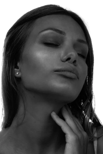 A monochrome portrait of a young woman on white background — Stock Photo, Image