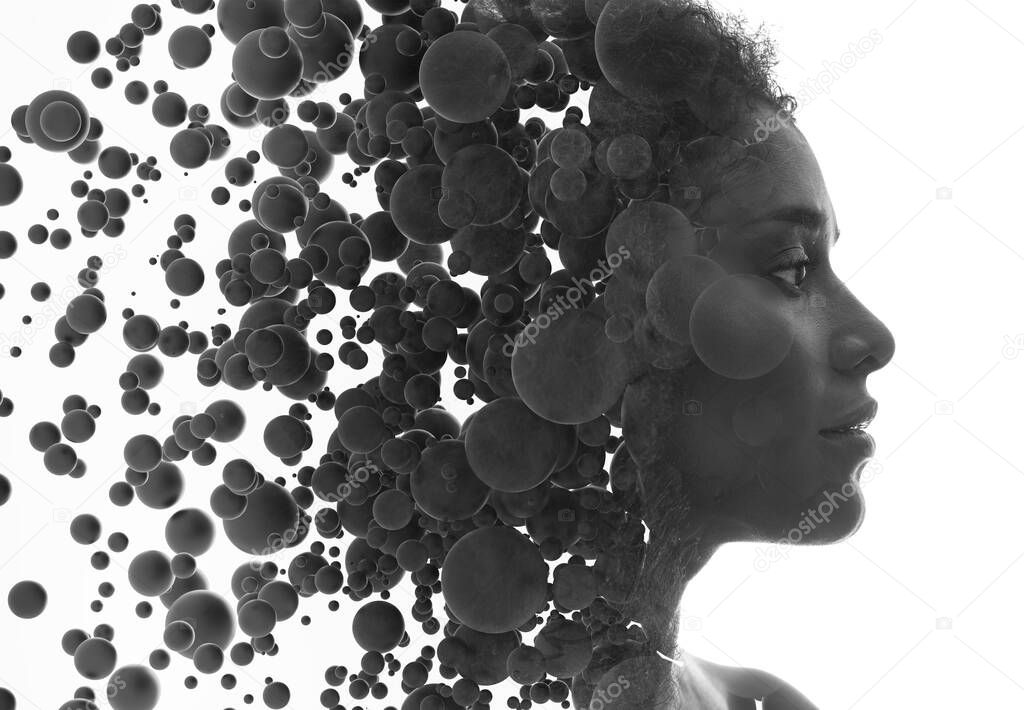 A portrait of young woman combined with countless spheres