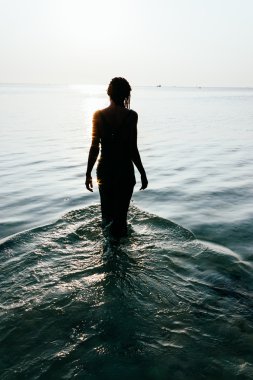 Woman in ocean clipart