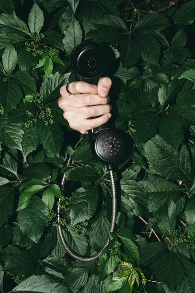 Telefonhörer in der Hand — Stockfoto