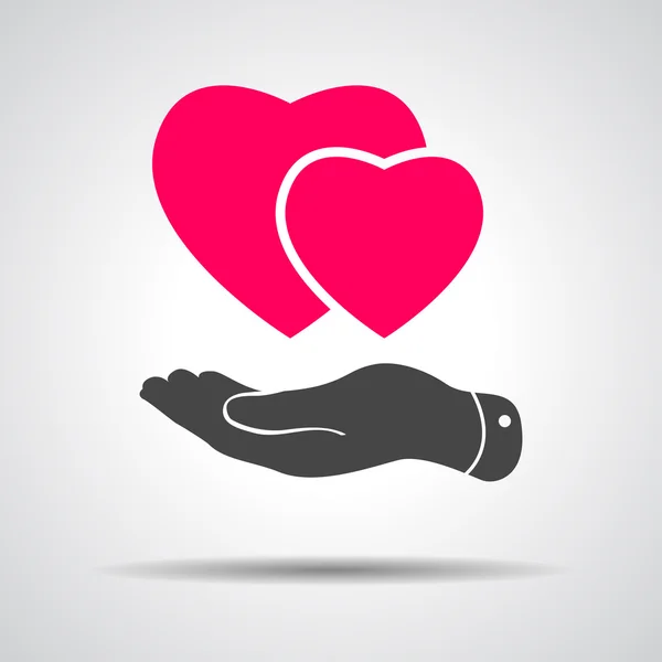 Mano plana con corazones rosados — Vector de stock