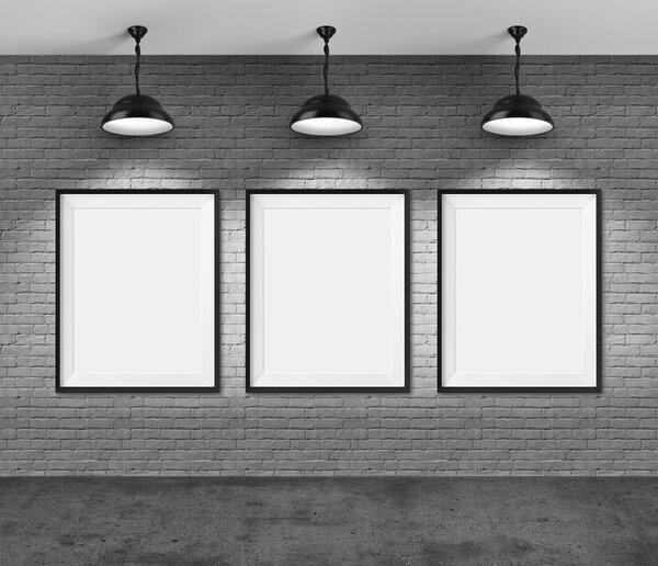 Art gallery. Blank picture frames on brick wall background.