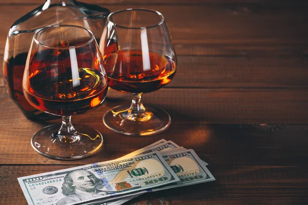 Two glasses of cognac and bottle — Stock Photo, Image