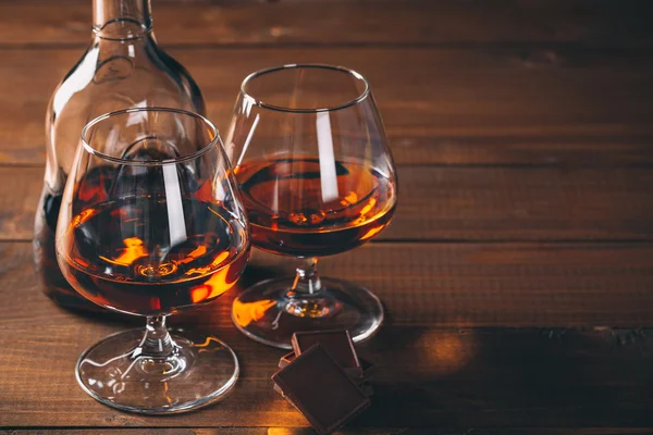 Glasses of cognac and bottle