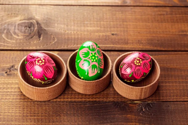 Painted Easter egg in little wooden nest — Stock Photo, Image