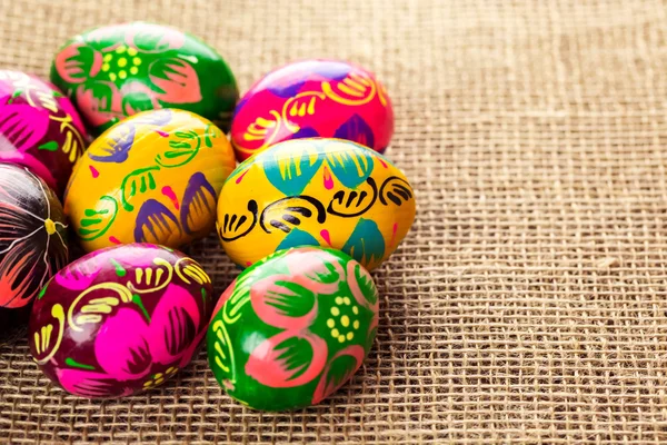Easter eggs on burlap background — Stock Photo, Image