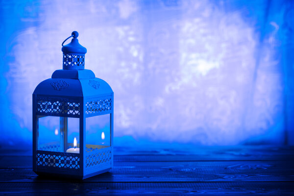 Beautiful background with a shining lantern Fanus Stock Photo