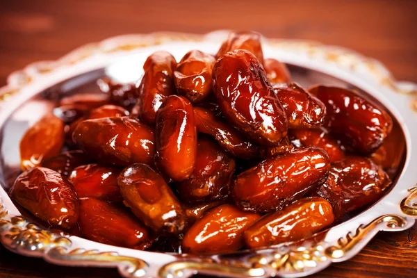 Beautiful background with dried dates — Stock Photo, Image