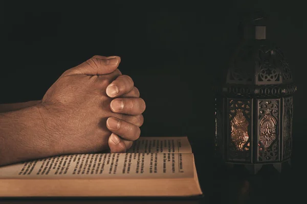 Hands Man Who Prays Muslim Holy Book Koran Black Background — Stock Photo, Image