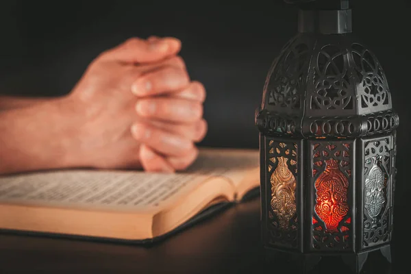 Hands Man Who Prays Muslim Holy Book Koran Black Background — Stock Photo, Image